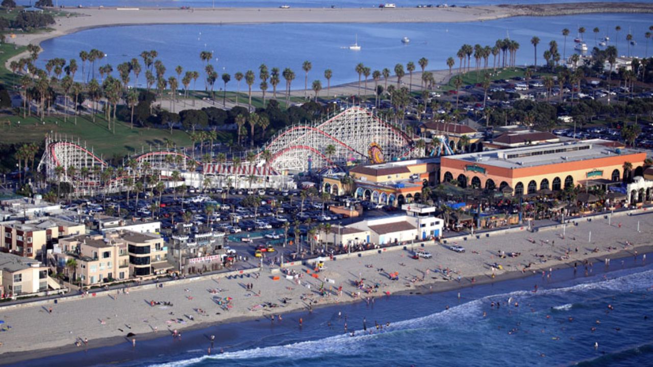Parasailing in the sky with epic ocean scenery below.