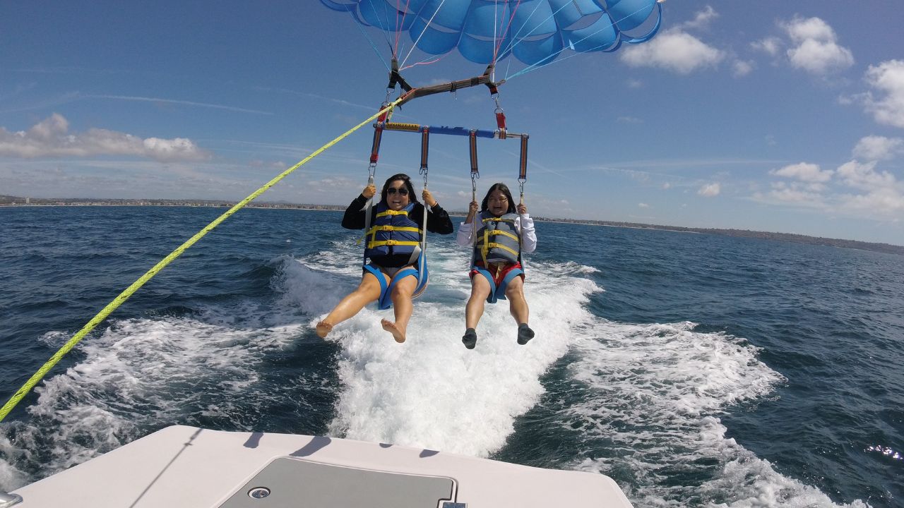 Kids enjoying a safe parasailing experience with Go Parasailing