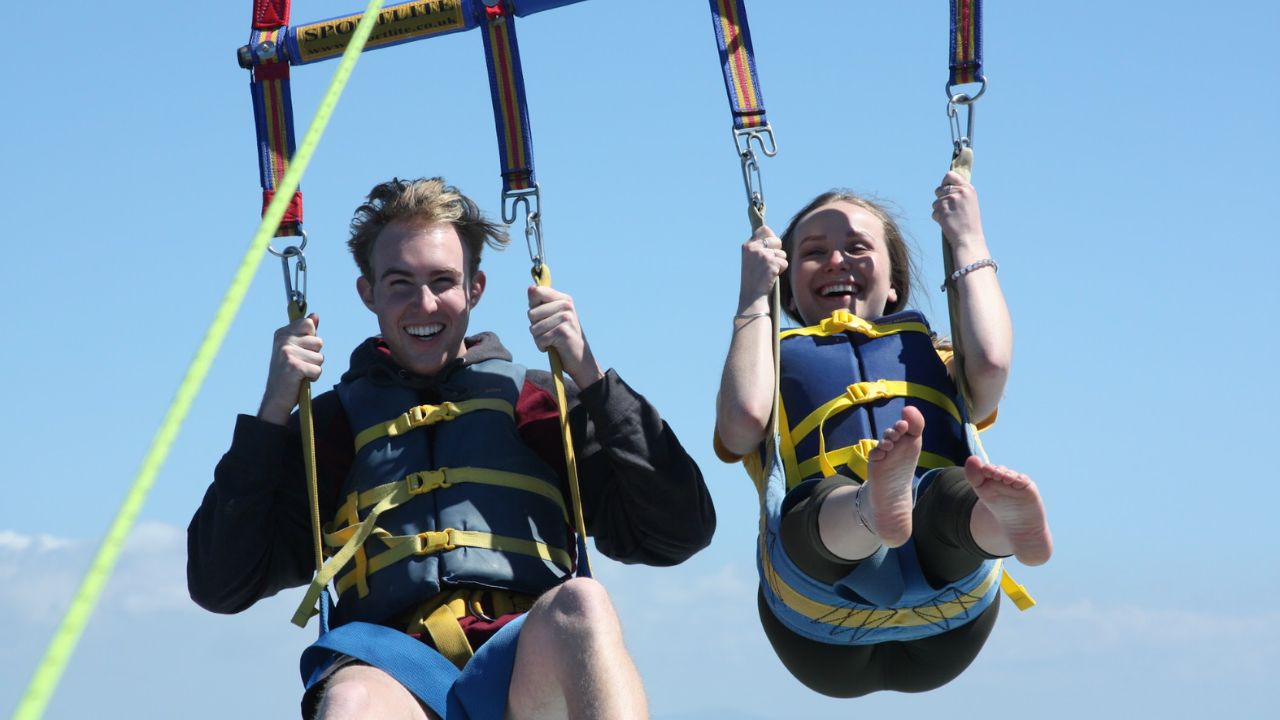 A thrilling aerial adventure creates lasting memories over the sea.